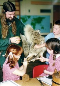 A chance for children to handle some of the artefacts during a Viking activity day.